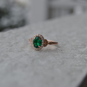 Custom Designed Oval Emerald with Diamond Halo Ring in Rose Gold