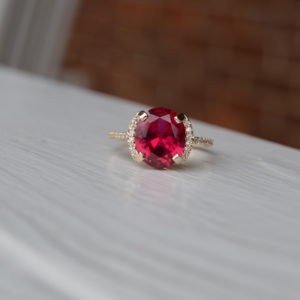 Custom Designed Oval Ruby and Diamond Ring in Yellow Gold