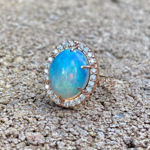 Custom Designed Oval Opal and Diamond Halo Ring in Rose Gold