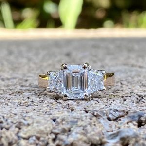 Custom Designed Three Diamond Ring with Emerald Cut Center and Trapezoid Cut Sides